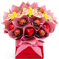 Love Bug chocolate bouquet with Chocolatier hearts, ladybugs and butterflies in a red box