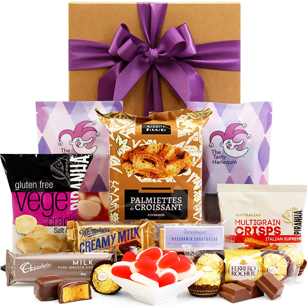 Little Nibbles gift hamper with biscuits, chocolates and snacks in a black gift box