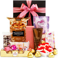Spoil Mum gift hamper with hand cream, chocolates and sweet treats in a black gift box