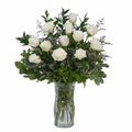 Dreamy Dozen luxurious white roses in a chic vase